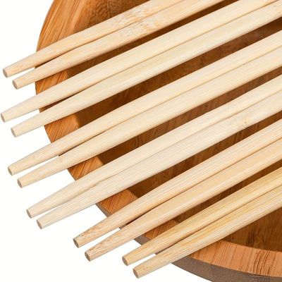 実用的な使い捨てチョップスティック 便利さと環境保護のために天然の竹で作られたカスタムバンブーツインチョップスティック